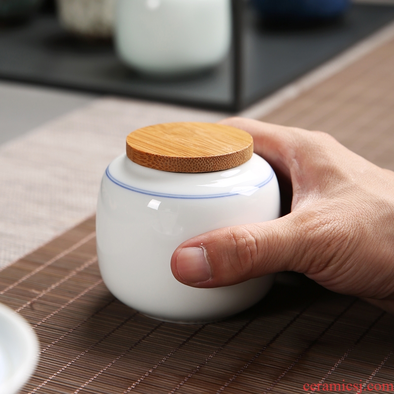 Passes on technique the up ceramic mini trumpet tieguanyin tea caddy fixings seal cylinder herbs can of portable storage POTS
