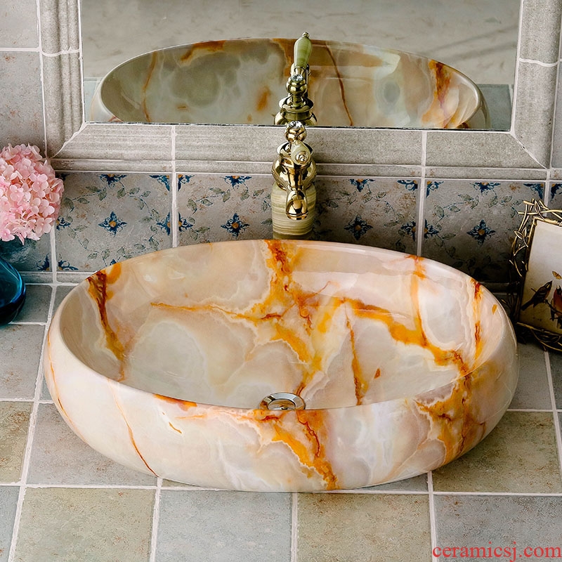 Stage basin oval imitation ceramic marble basin European household art creative simple toilet washs a face plate