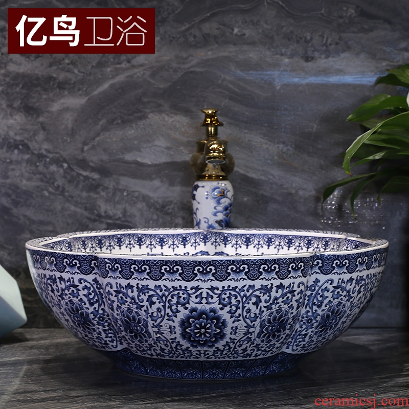 Million birds on the blue and white porcelain basin jingdezhen ceramic lavatory basin of Chinese style art basin petals round the sink