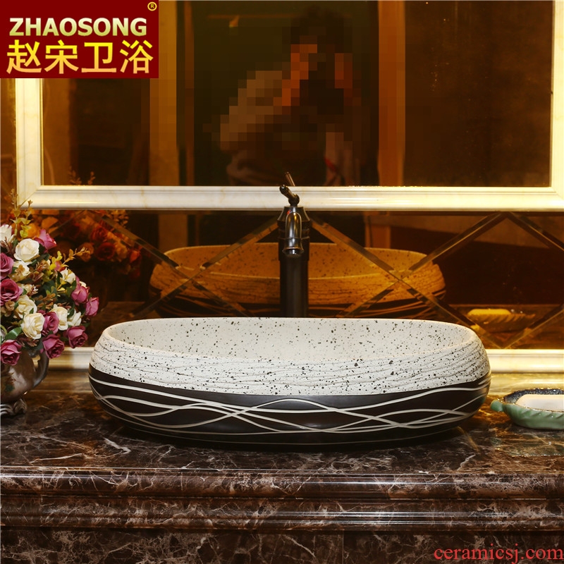 Wash basin on the ceramic basin sink more oval ceramic art basin of household of Chinese style water basin