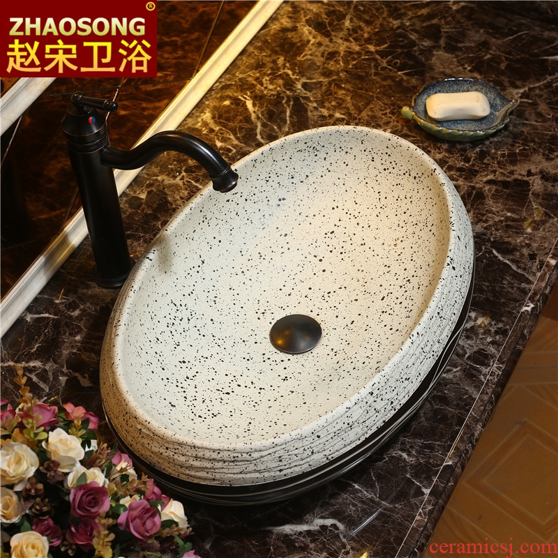 Wash basin on the ceramic basin sink more oval ceramic art basin of household of Chinese style water basin