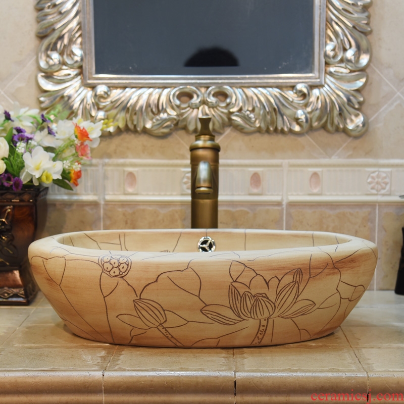 Jingdezhen ceramic lavatory basin stage basin, art basin sink oval with double carved lotus overflowing