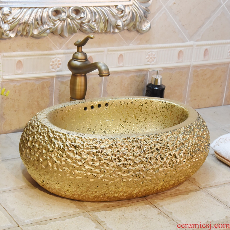 Jingdezhen ceramic lavatory basin basin sink art on elliptic gold - plated with excessive water basin