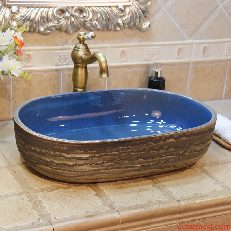 Jingdezhen ceramic lavatory basin basin sink art on elliptic gray jump cut snowflakes glaze up