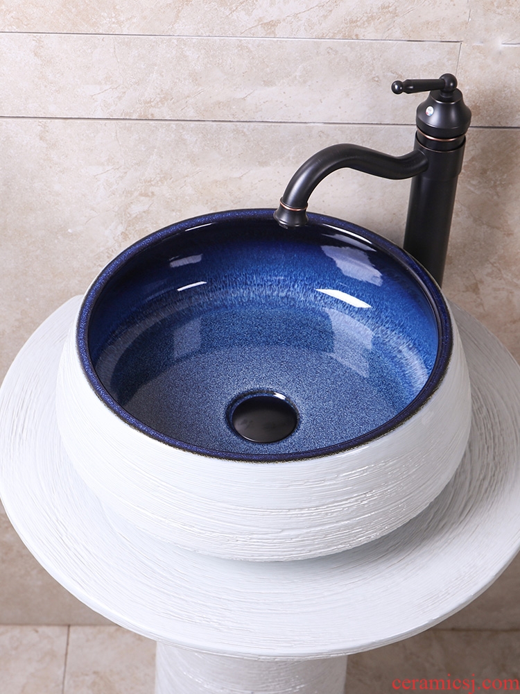 The sink basin integrated creative pillar face basin bathroom floor type of household ceramics art for wash basin