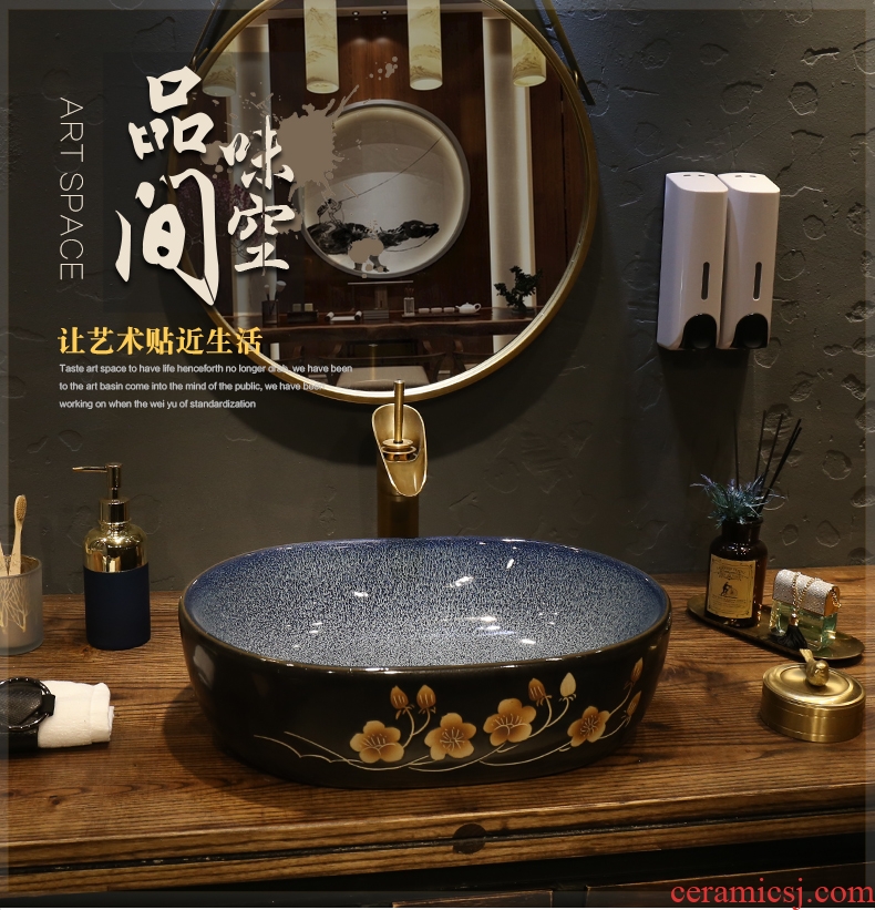 Household washing basin in northern ceramic wash lavatory oval balcony toilet stage basin of the basin that wash a face on stage