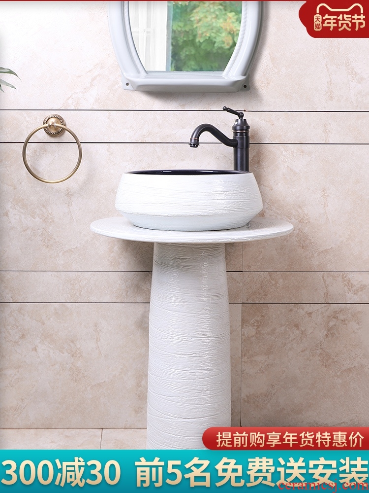 The sink basin integrated creative pillar face basin bathroom floor type of household ceramics art for wash basin