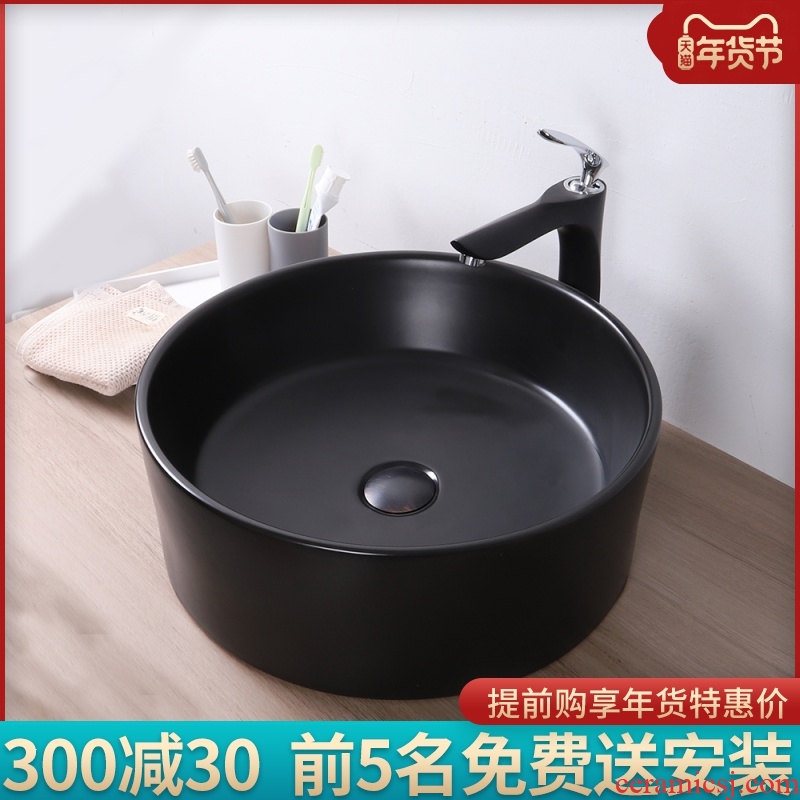 Basin of northern Europe on the ceramic lavabo round black contracted household bathroom European art Basin