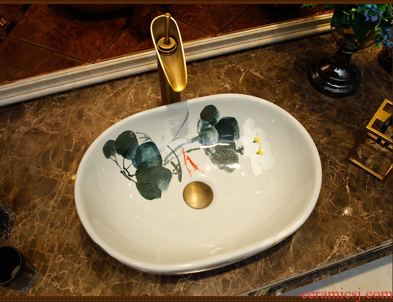 Contracted ceramic water basin on the basin washing a face small elliptic shape household washing basin bathroom art basin