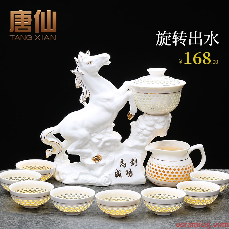 Tang Xian a complete set of blue and white semi - automatic tea sets ceramic tea set against the very hot creative tea set lazy person household make tea
