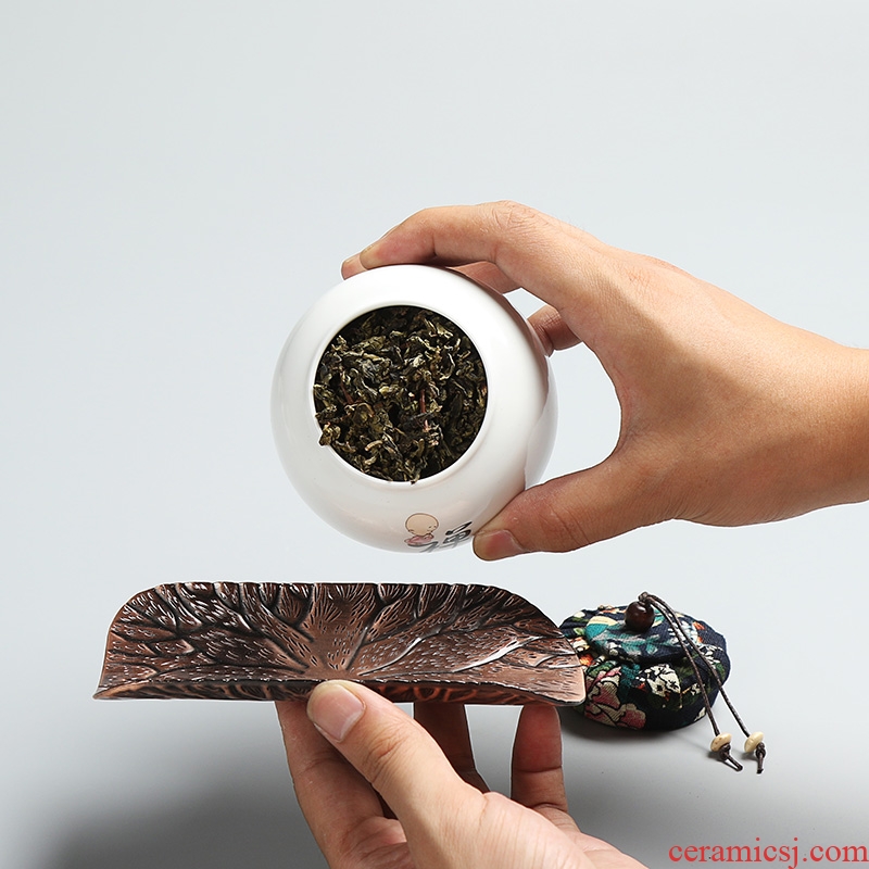 Inferior smooth ceramic tea caddy fixings seal box travel tea warehouse storage pot pu 'er tea POTS, tea set