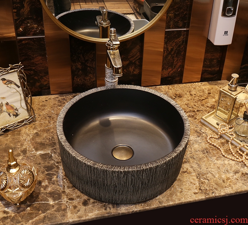 Basin of northern Europe on the ceramic lavabo round black contracted the lavatory Basin of restoring ancient ways is the stage Basin European art