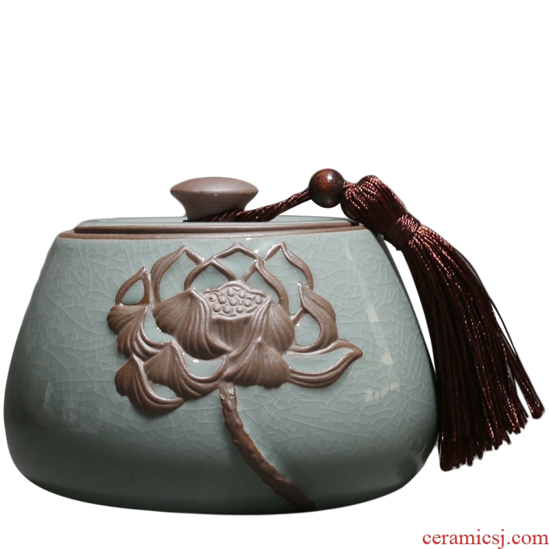 Embossed lotus caddy fixings YanXiang fang elder brother up with ceramic seal storage jar, tassel as cans