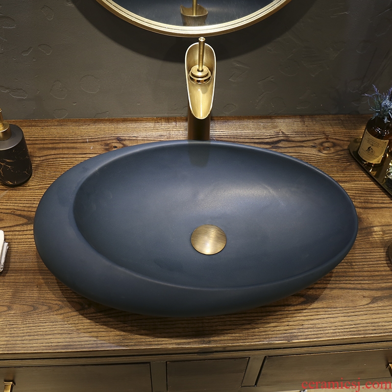 Creative Nordic ceramic elliptical stage basin sinks contracted household toilet lavabo European art basin