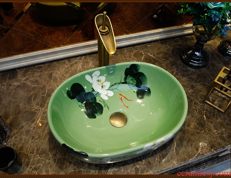 Contracted small ellipse ceramic water basin ceramic face basin of the stage hands basin bathroom art basin of Europe type