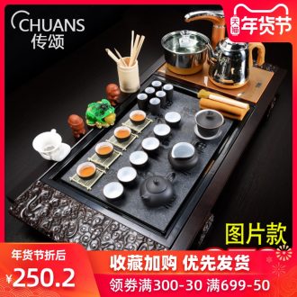 Talk of household solid wood tea set home sitting room ground ceramic kung fu tea sets of a complete set of automatic electric appliance