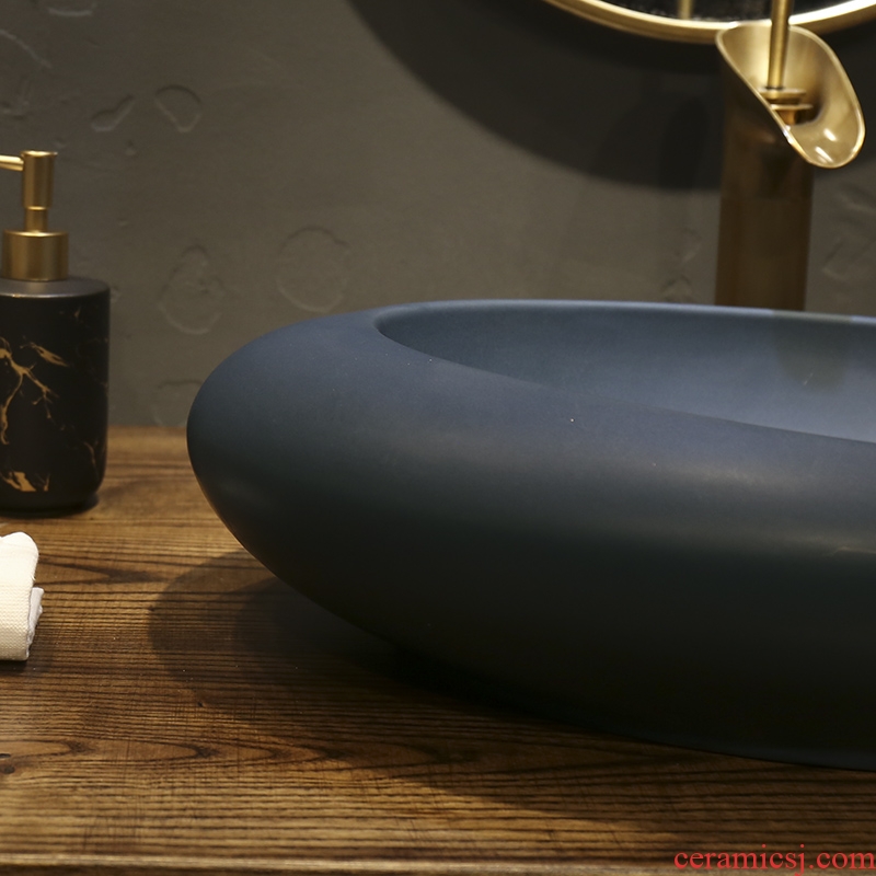 Creative Nordic ceramic elliptical stage basin sinks contracted household toilet lavabo European art basin