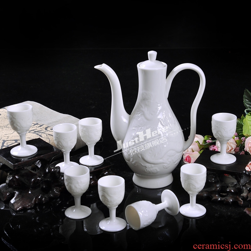 Jingdezhen ceramic wine suits for about nine cows pure white anaglyph dragon wine hip flask glass suite gift box