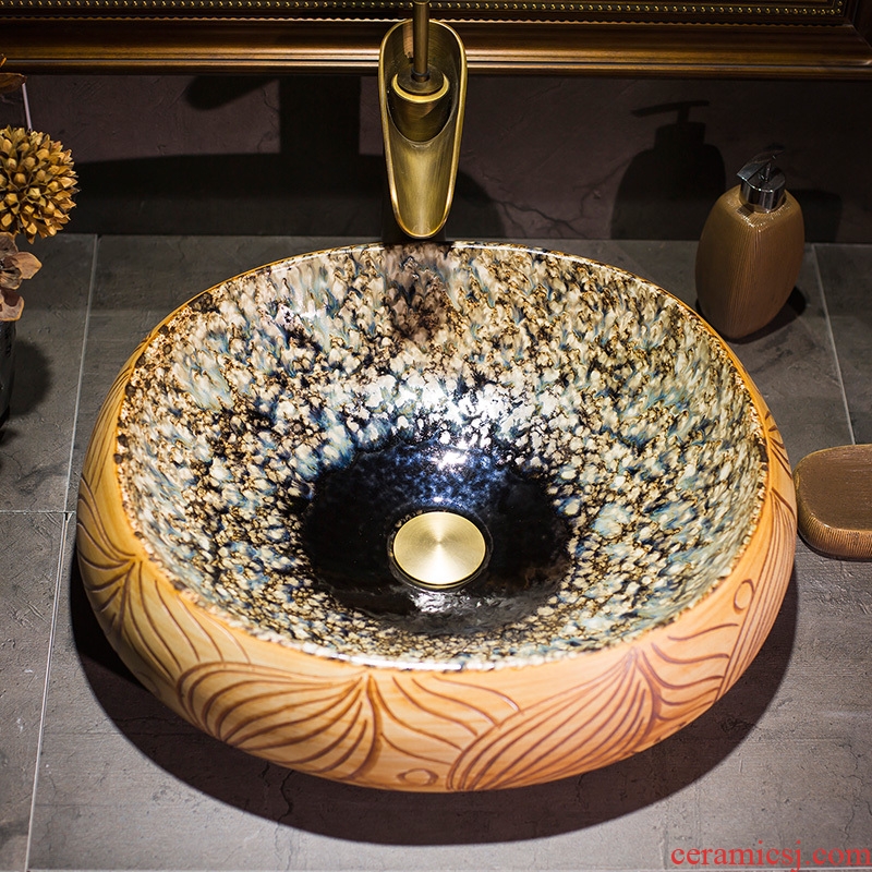 Chinese jingdezhen up art stage basin oval ceramic lavatory toilet stage basin on the sink