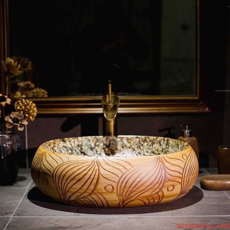 Chinese jingdezhen up art stage basin oval ceramic lavatory toilet stage basin on the sink