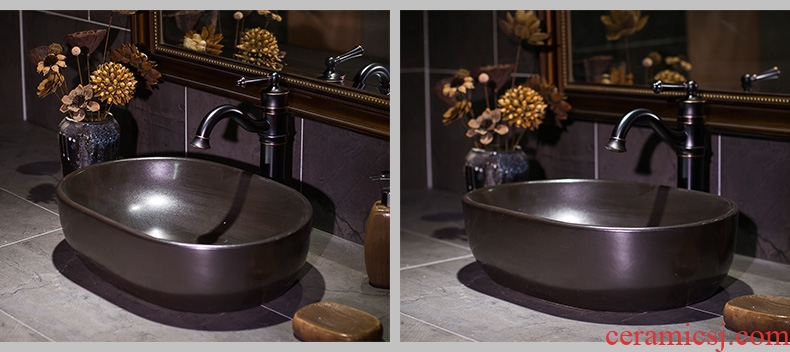Black metal basin on its European ceramic glaze art petals lavatory basin basin on the sink