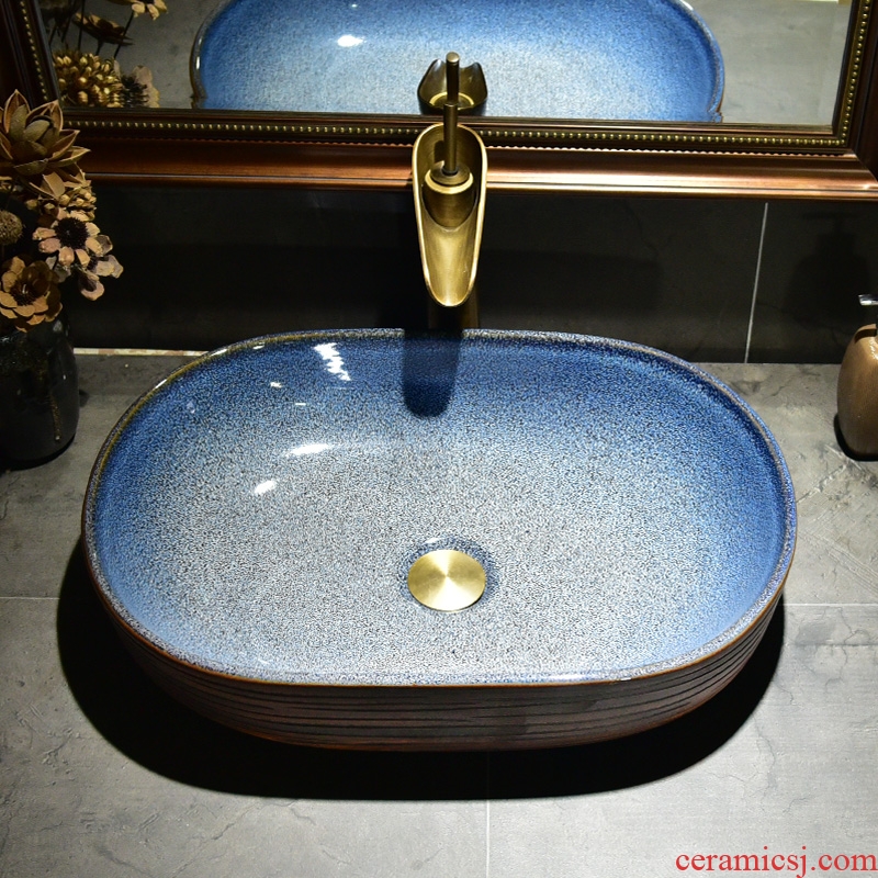 The stage basin sink oval ceramic basin small household bathroom sinks American art continental basin