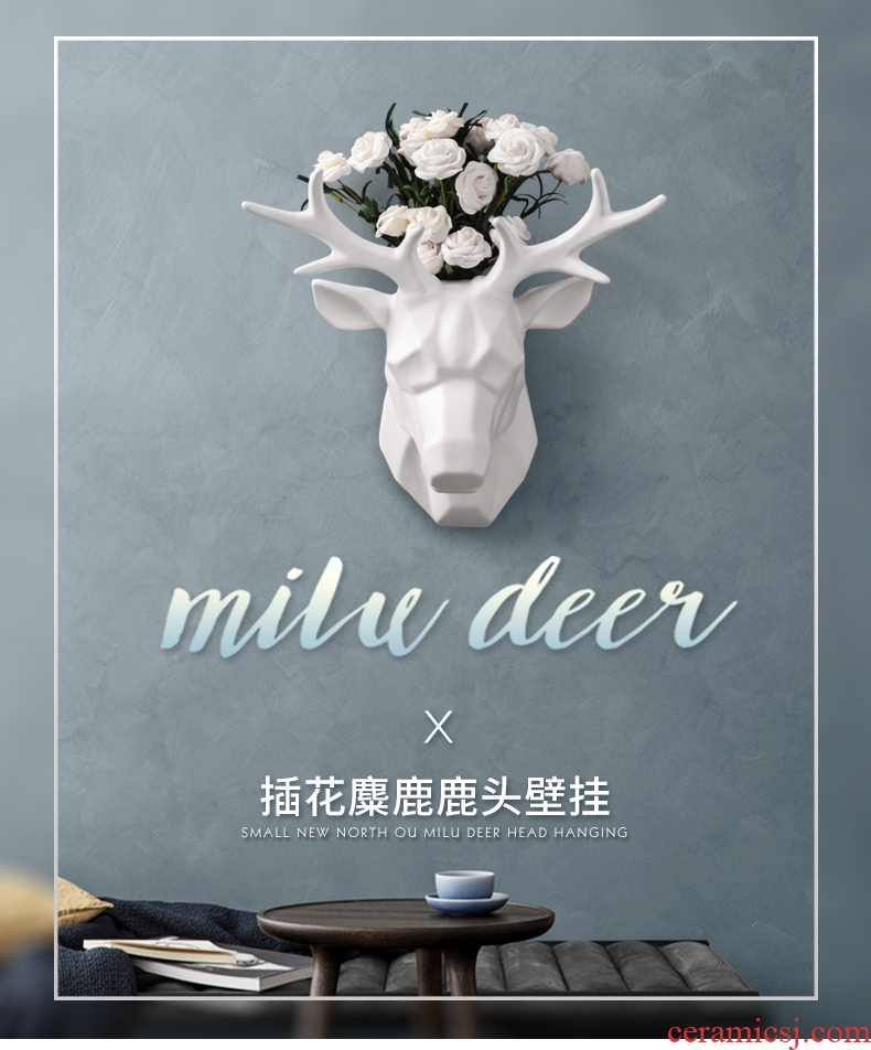 Creative home wall decoration decoration I and contracted deer head hanging of pottery and porcelain brought flowers decorate the sitting room porch flowers on the wall