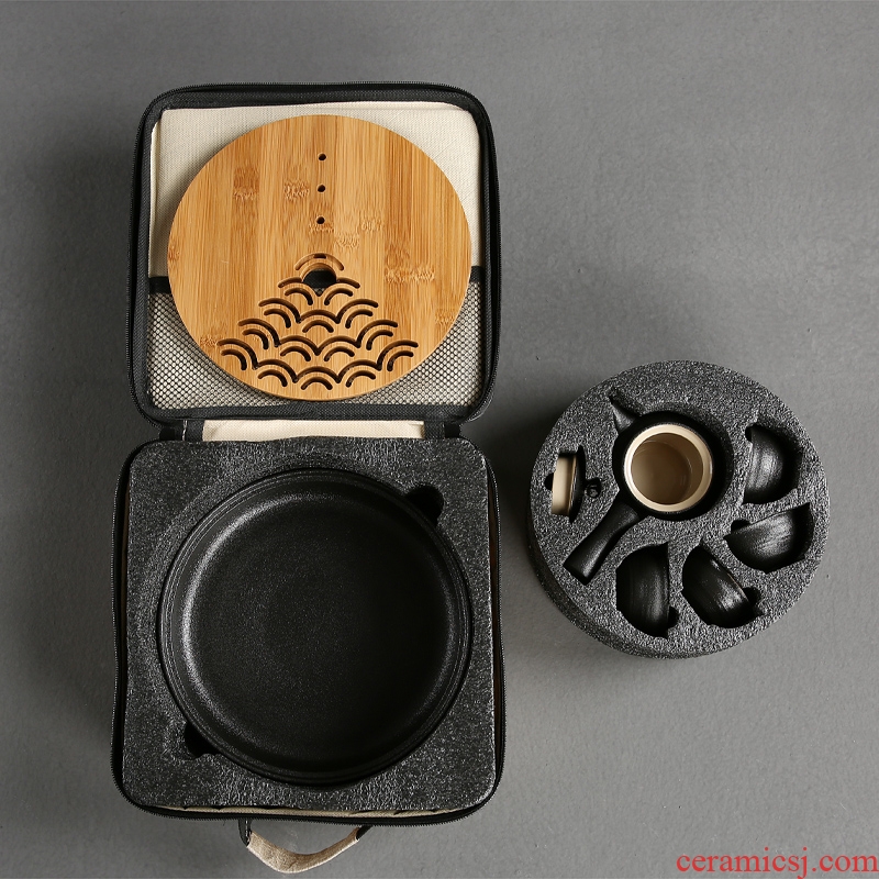 Passes on technique the Japanese black pottery up portable travel kung fu tea set the cloth of a complete set of ceramic tea set the teapot tea tray
