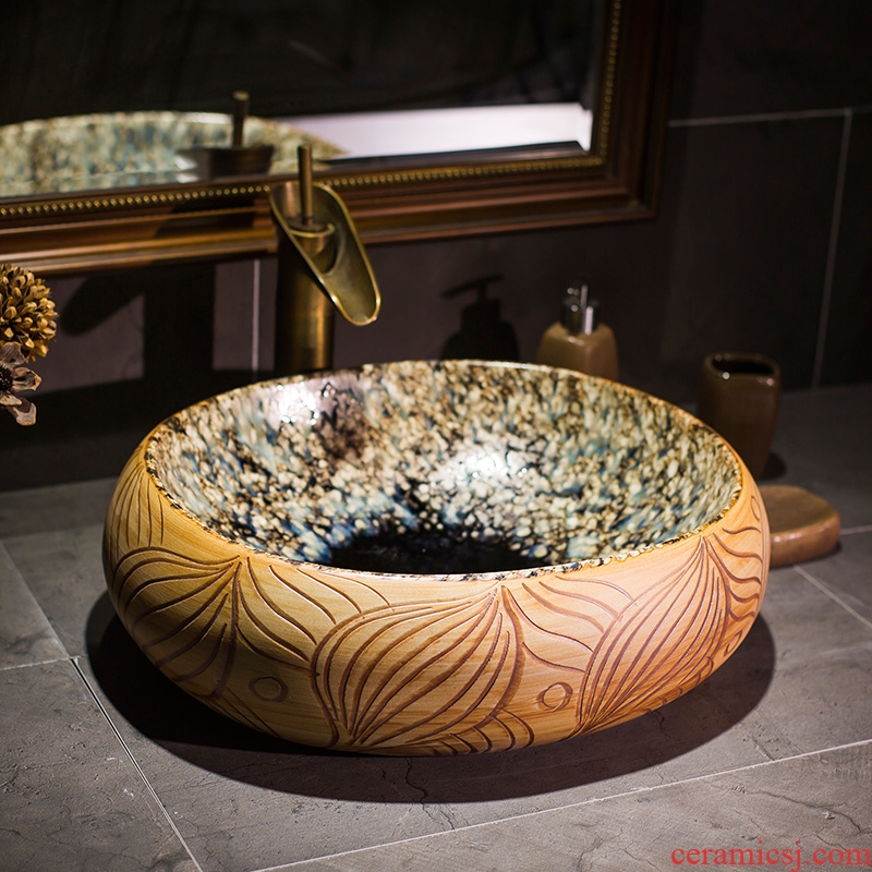 Chinese jingdezhen up art stage basin oval ceramic lavatory toilet stage basin on the sink