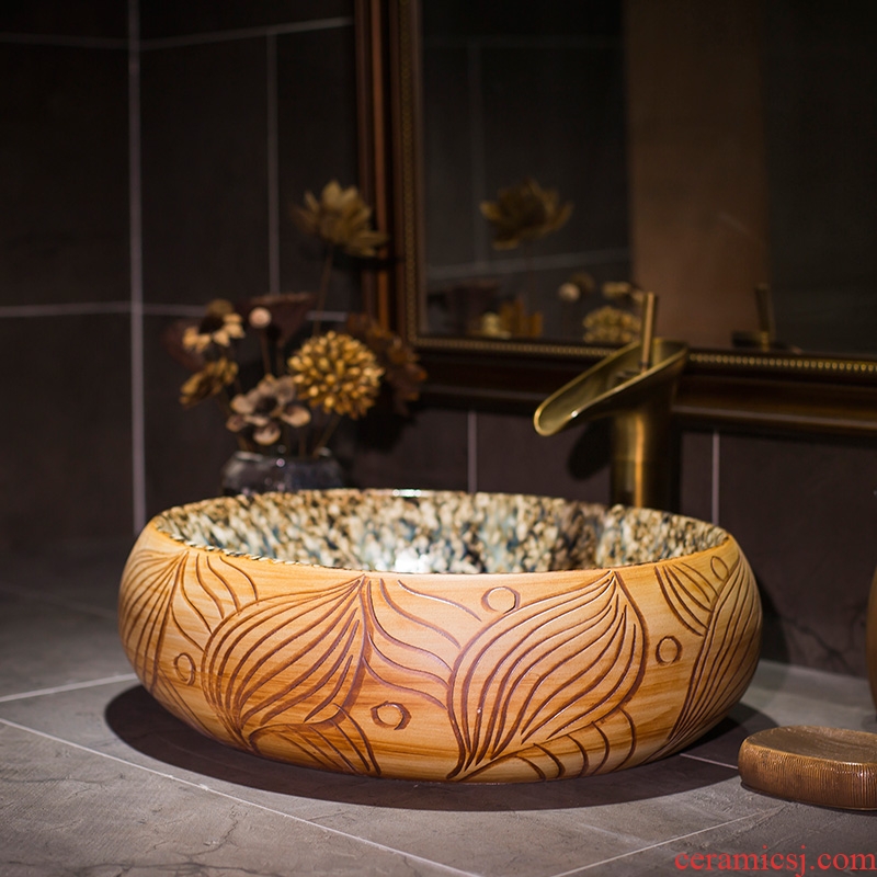 Chinese jingdezhen up art stage basin oval ceramic lavatory toilet stage basin on the sink