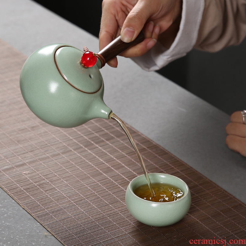 Passes on technique as on the side of your up up teapot Japanese ebony handle to open the slice your porcelain ceramic kung fu tea set a pot of two packages