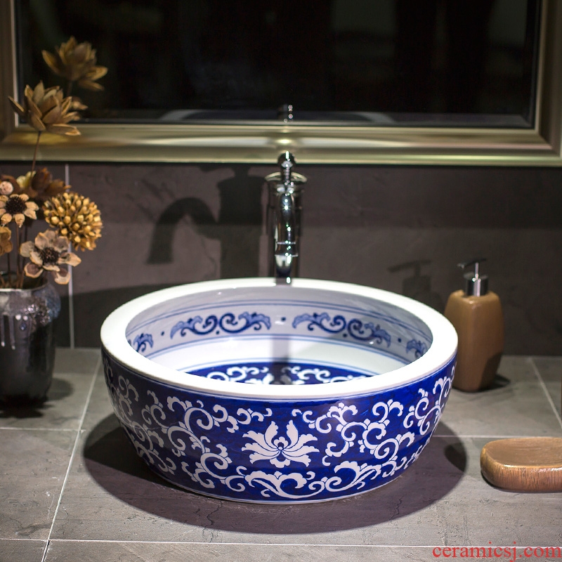 Continental basin round ceramic lavatory art on the small blue and white porcelain basin small size on the sink