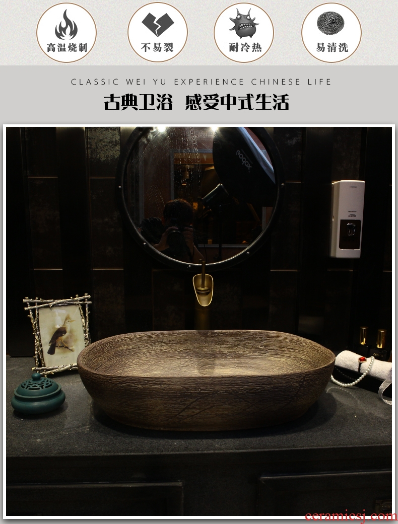 Happens the oval basin basin lavatory basin of Chinese style art stage basin sink ceramic household the pool that wash a face