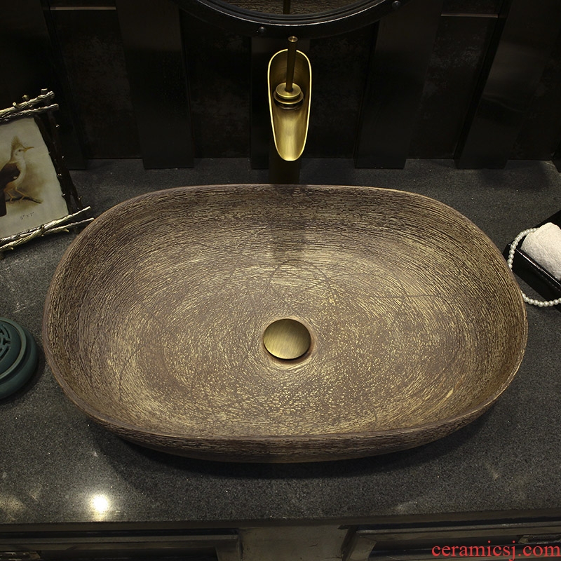 Happens the oval basin basin lavatory basin of Chinese style art stage basin sink ceramic household the pool that wash a face