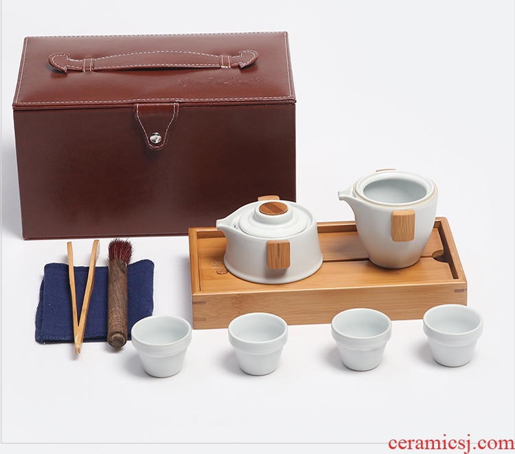 The Product porcelain sink "street" on the pot of business travel ceramic tea set four cups crack cup to carry a pot of tea tray