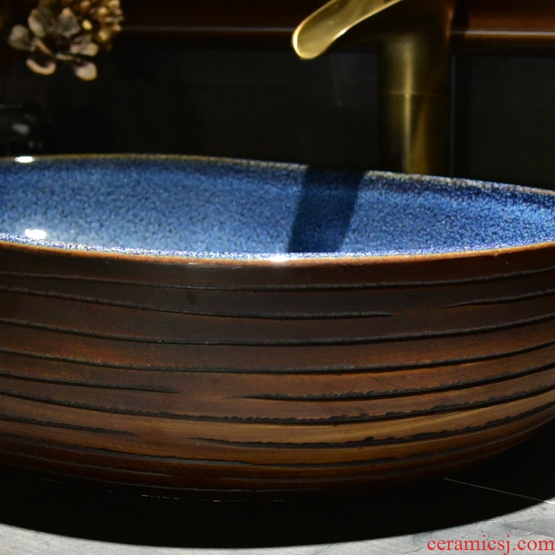 The stage basin sink oval ceramic basin small household bathroom sinks American art continental basin