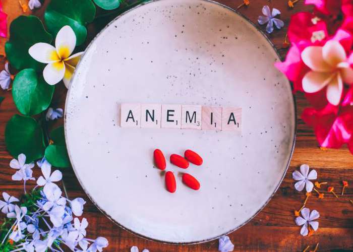 Anemia written on a plate. What is anemia and what are the natural treatments for anemia.