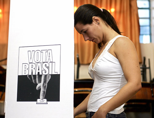 A woman votes during Brazilian president
