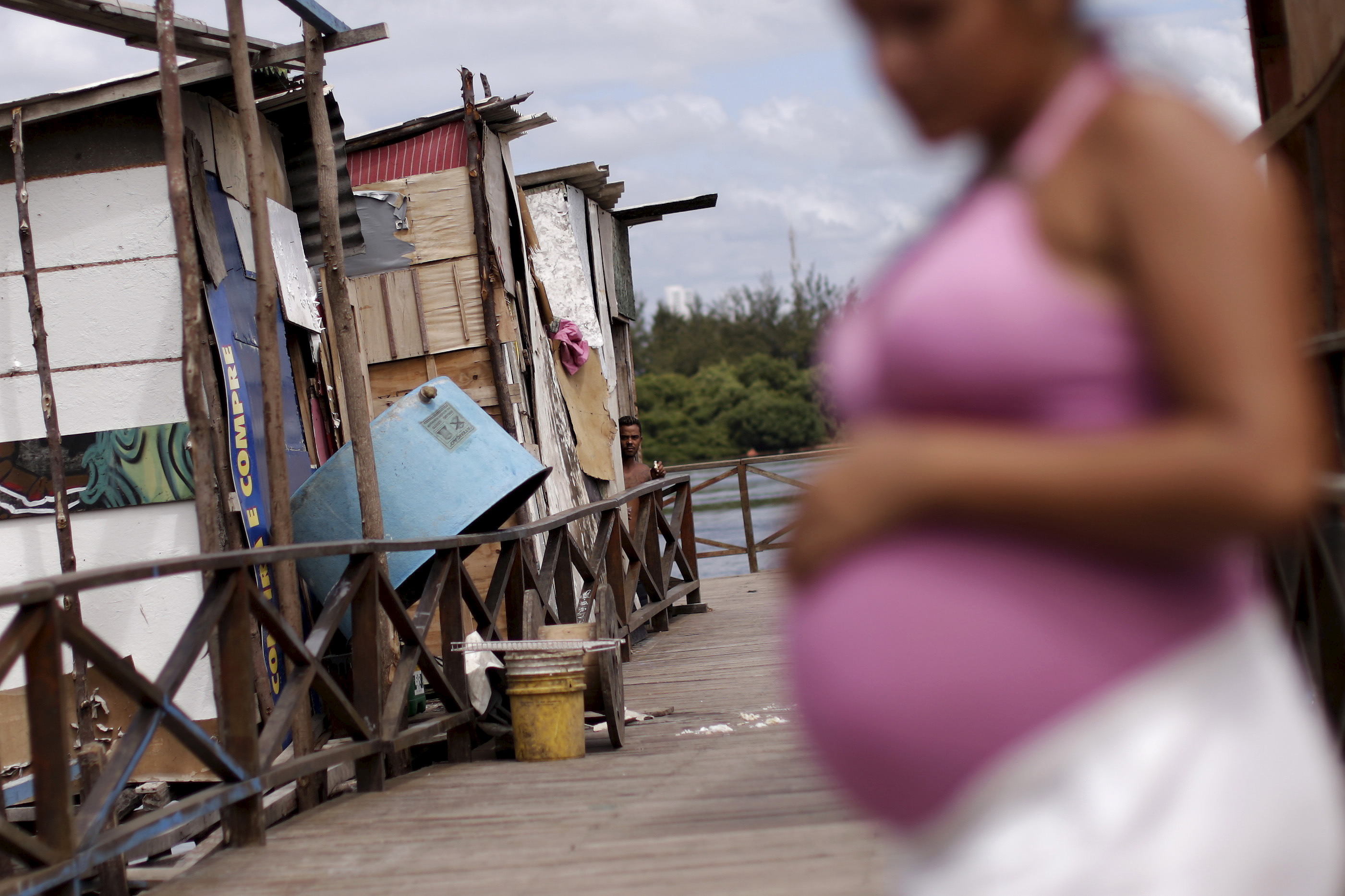 Lediane da Silva, who is 8 months pregnant, is seen in the shanty town of Beco do Sururu, Recife, Brazil