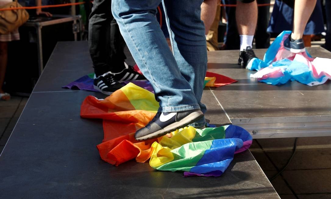 x89617424_FILE-PHOTO-People-step-on-LGBT-rainbow-flags-as-Polish-nationalists-gather-to-protest-a.jpg.pagespeed.ic.ZZrZONQLdy