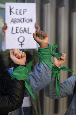 front-view-women-protesting-outdoors