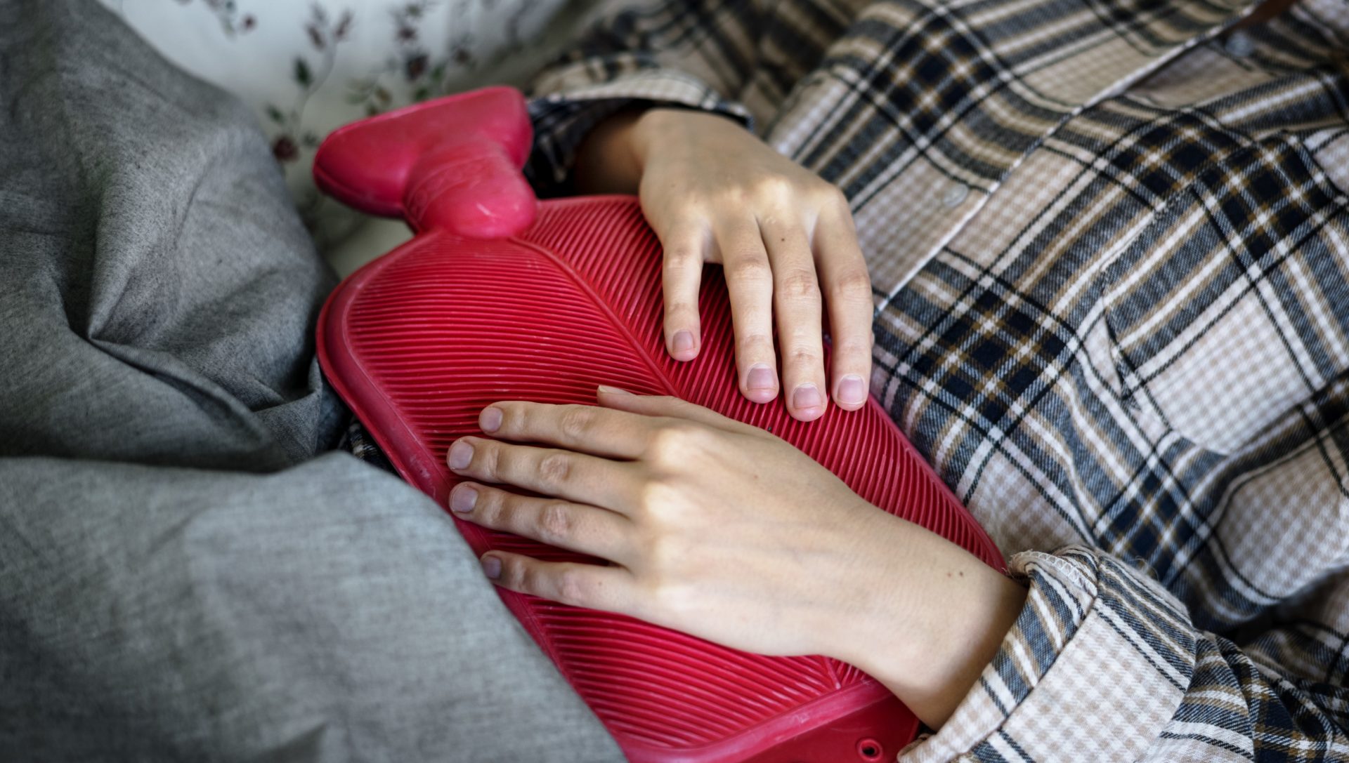 Caucasian woman having painful period cramps