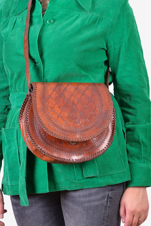 Vintage tooled leather saddle bag