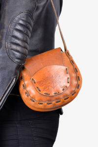 Vintage 1970's tooled leather shoulder bag