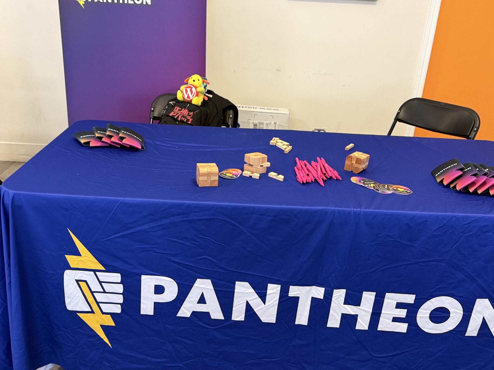 Wapuu guarding the table at Bay Area DrupalCamp 2025