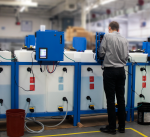 Technician assembling medical disinfecting equipment within one of PEKO's contract manufacturing facilities.
