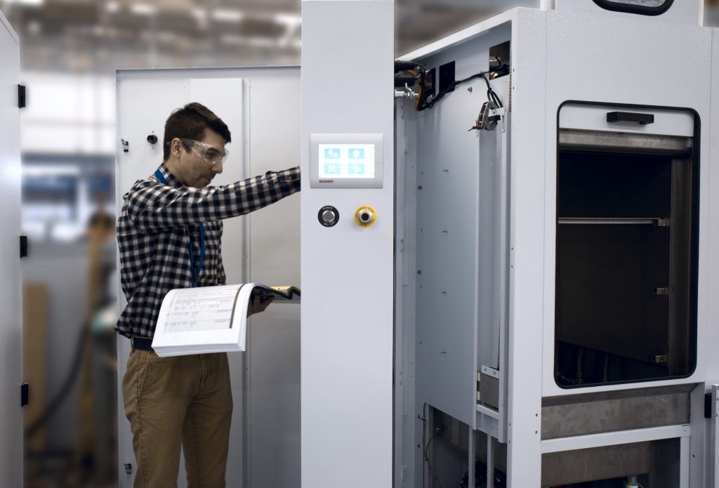 Assembler running tests on machinery 