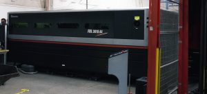 AMADA fiber laser with operator behind stand 