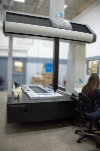DEA advantage CMM inspecting large CNC machined part