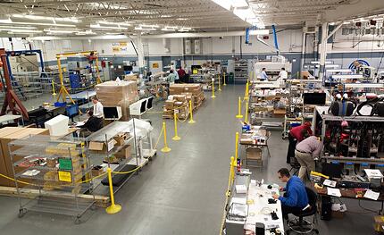 Contract Manufacturing Floor with engineers and assemblers hard at work
